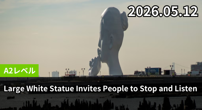 Large White Statue Invites People to Stop and Listen